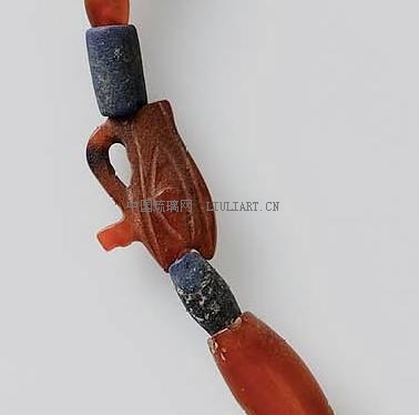 String of beads and amulets_2061–1640 B.C..JPG